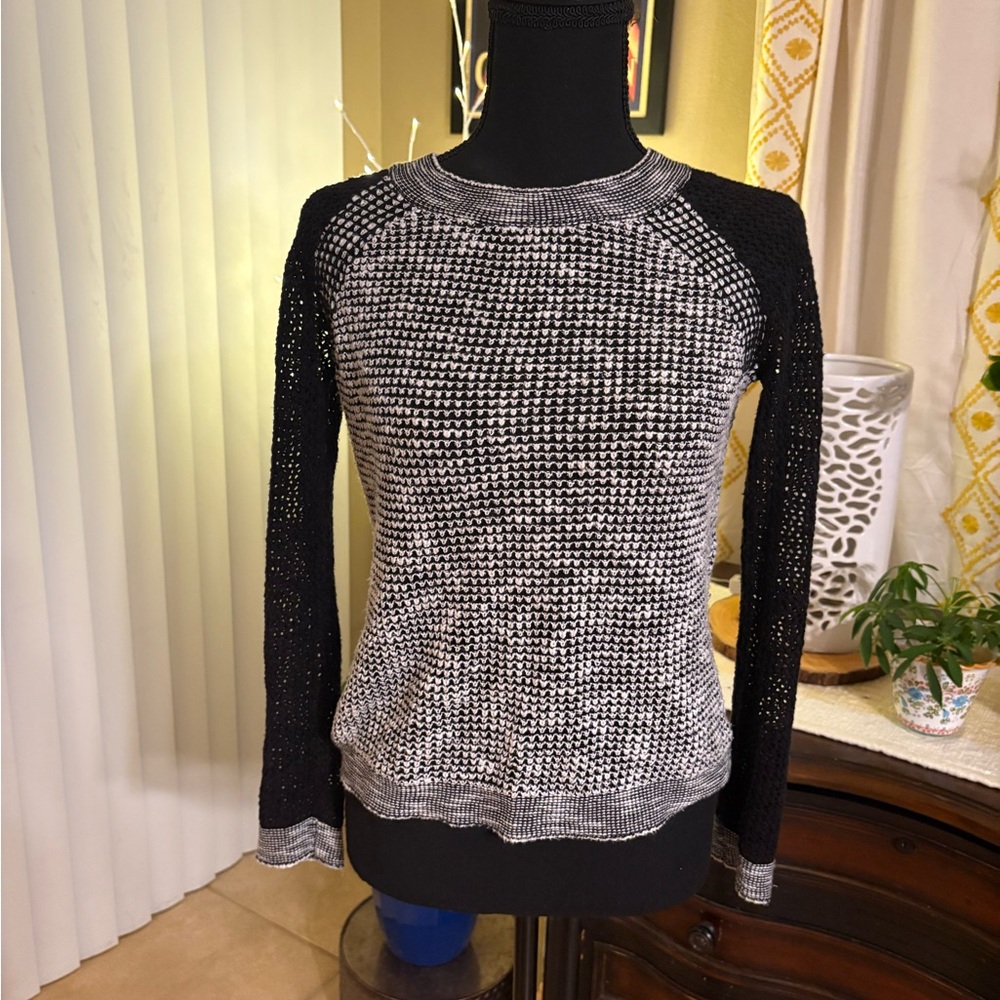 Super cute knitted black & white sweater.